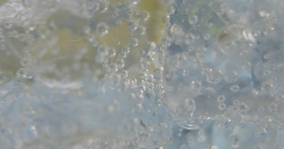 Bubbles rise in liquid