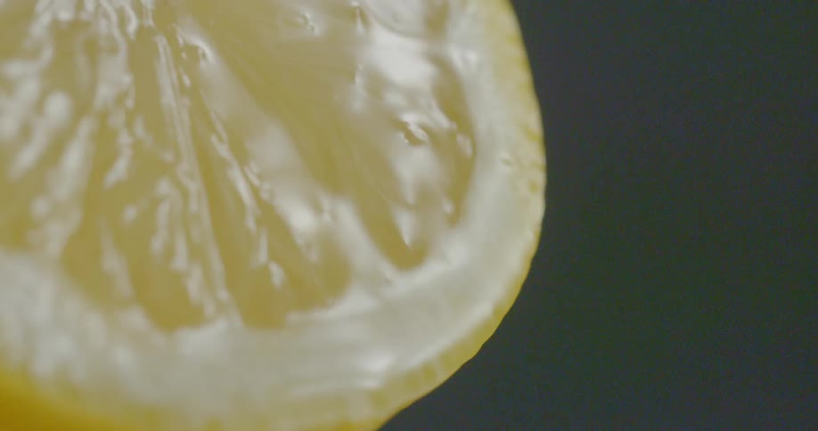 Juice flows on the surface of a cut lemon