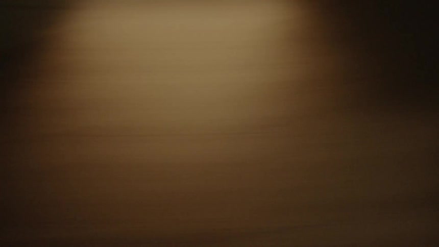 Camera sporadically moving left and right inside a building