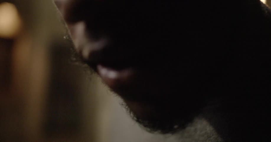 Close up of man face whispering