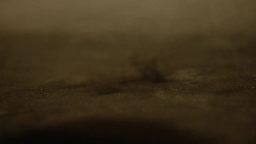 Dirt and dust pop up when a basketball is bounced on it