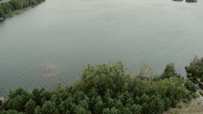 Waves move across the surface of a lake