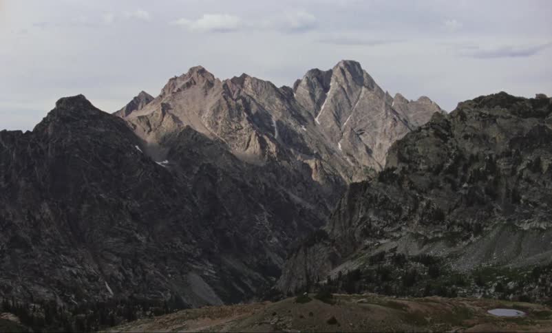 Mountain range at sunrise on clear day