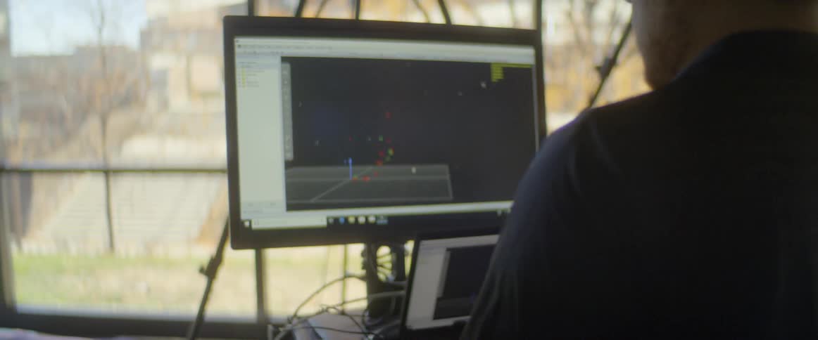 Man reviews graphic representation of kinesthetic motion