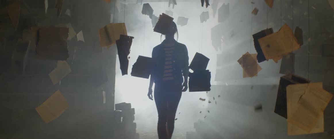 A woman walks into a room with floating books