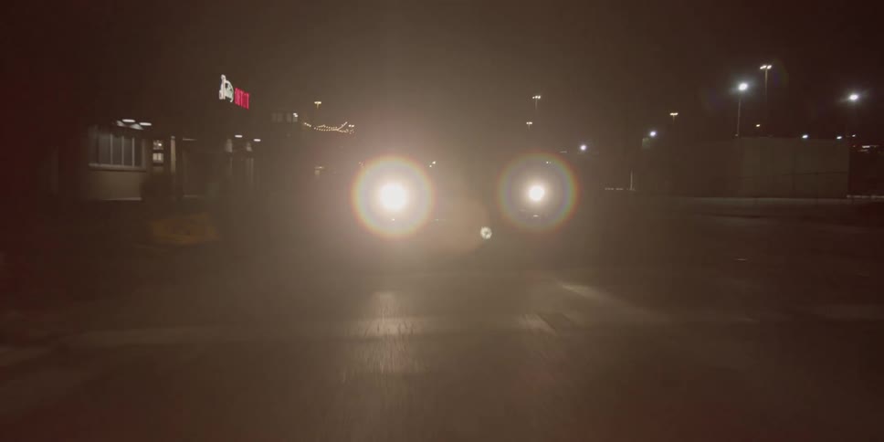 A car is driving on a road
