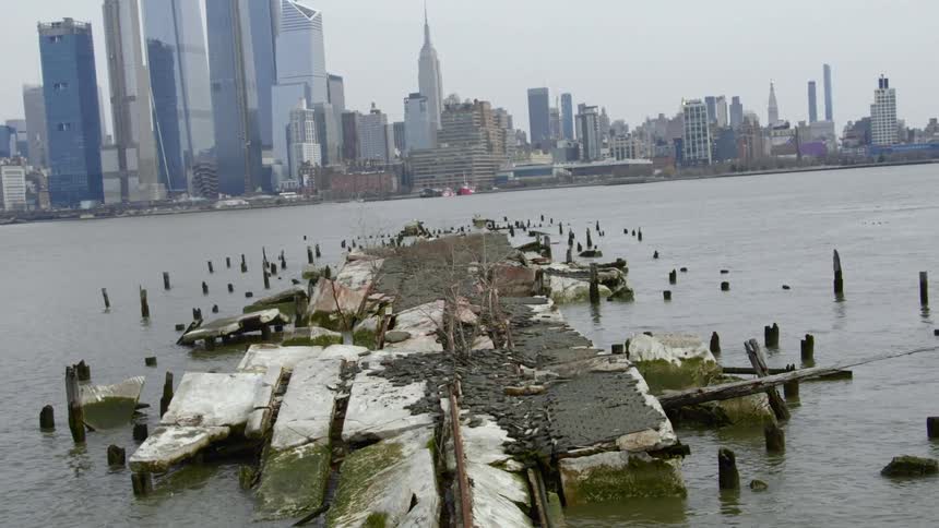 The pier is demolished across the way from the city