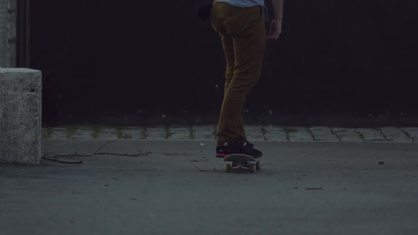 A person rides a skateboard