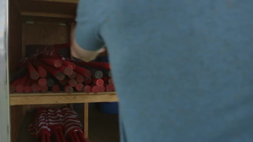 Flags are stored in a wooden container
