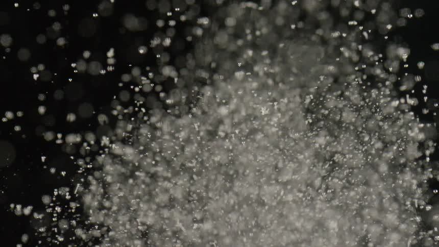 Bubbles and particles flow and float in liquid