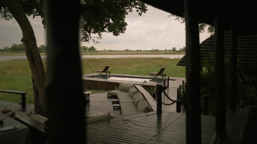 A resort with chairs and a jacuzzi