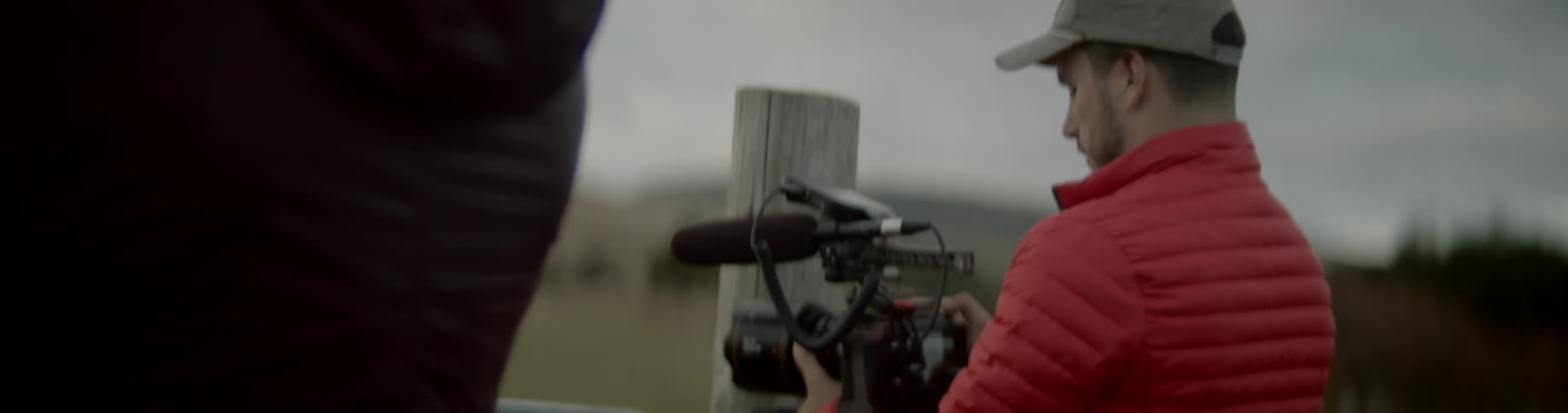Photographers take pictures and film outdoors