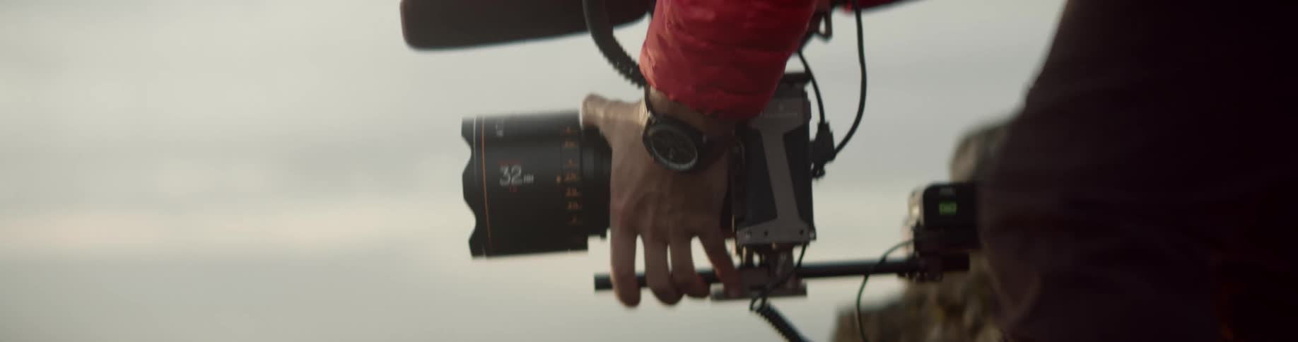A person is filming the rocks on the mountain