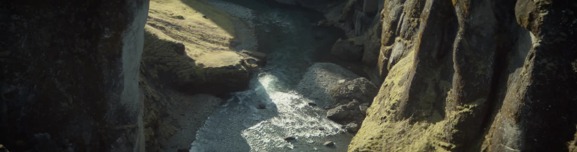 The river below runs past the mountains
