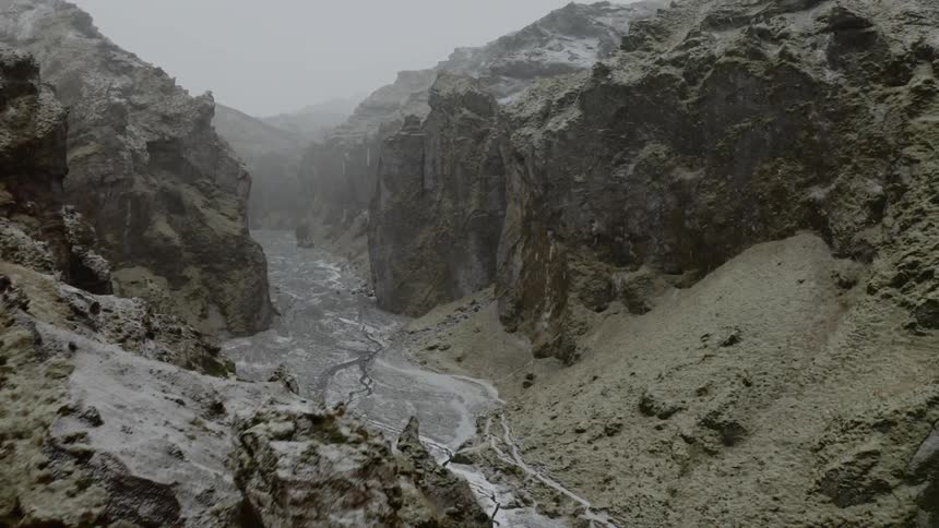Sleet and snow across a mountain range