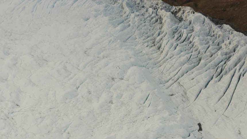The hills are covered with ice