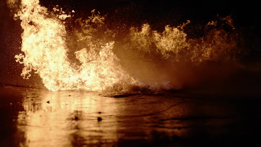 A large fire spreads across land
