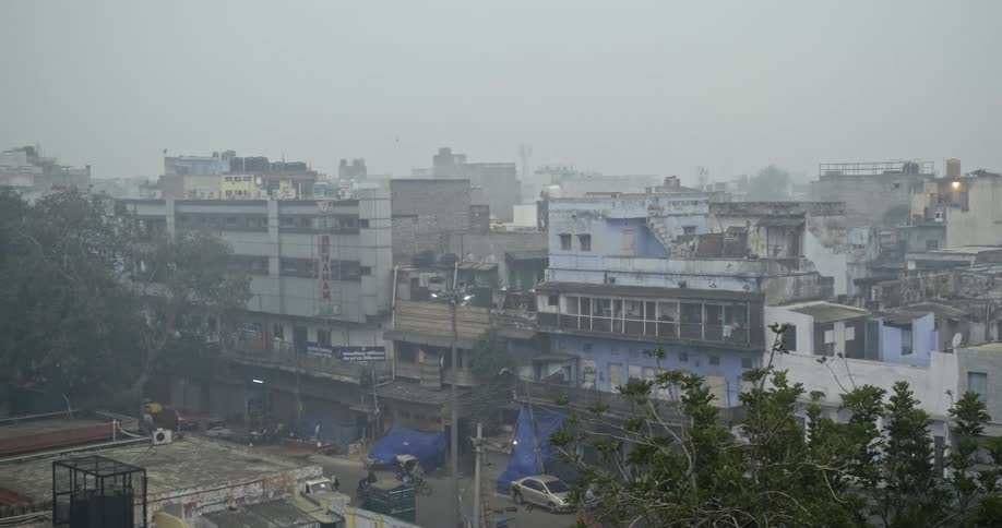 Dense urban city covered in pollution