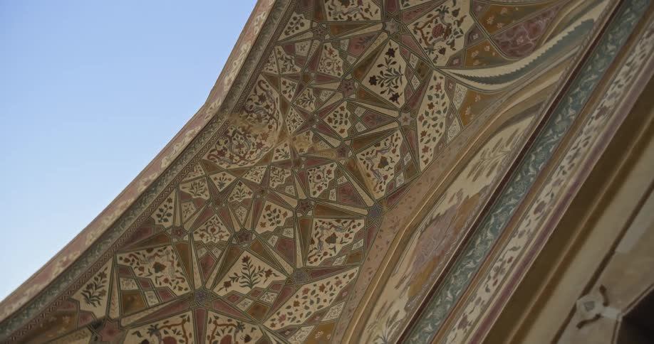 Ornate mosaic tile eaves of Ganesh Pol Entrance in Amer Fort India