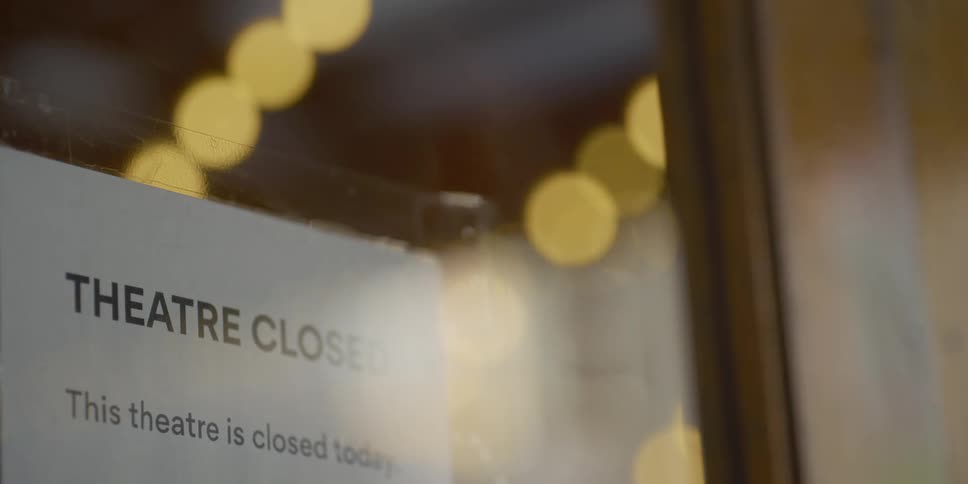 A closed sign in a window