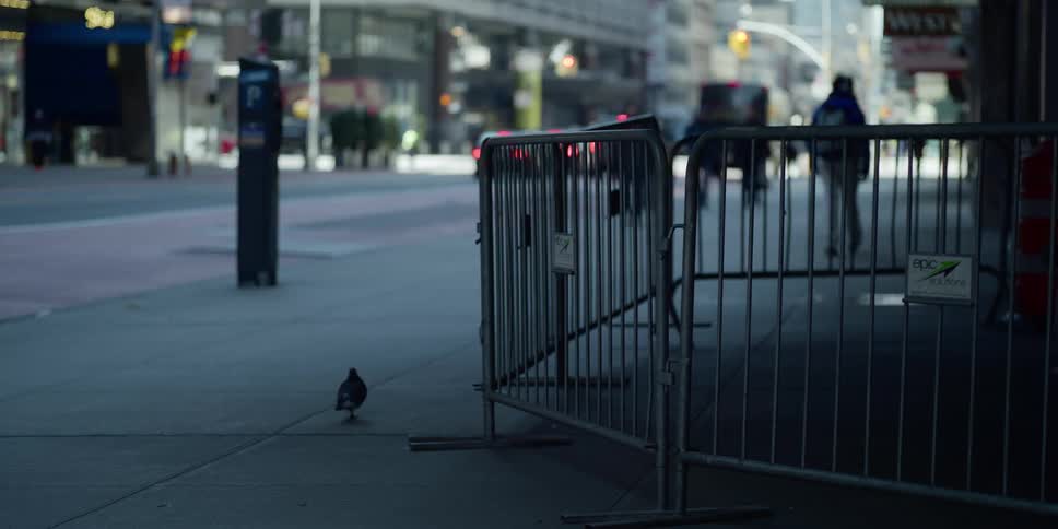 People walking and biking in a city street