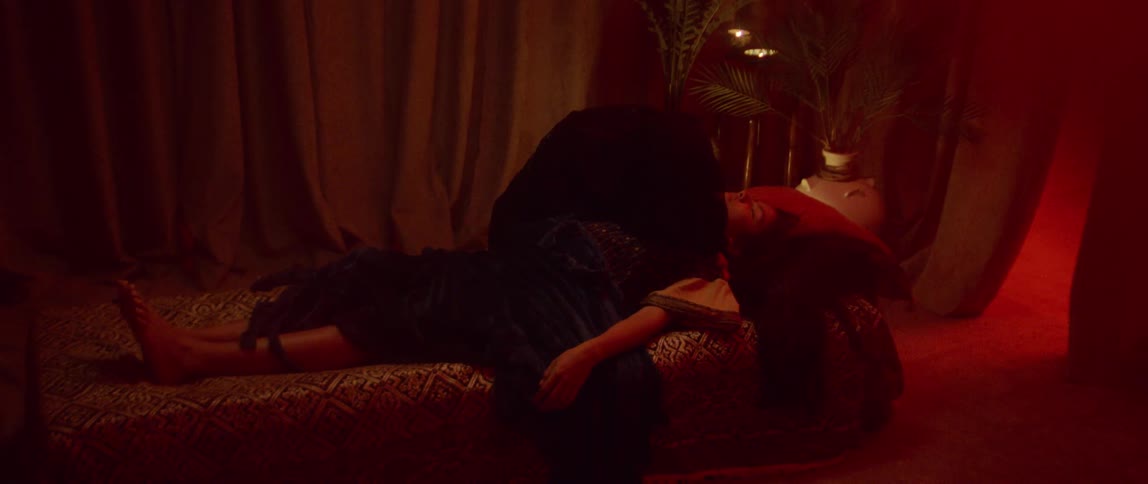 A person lays over another