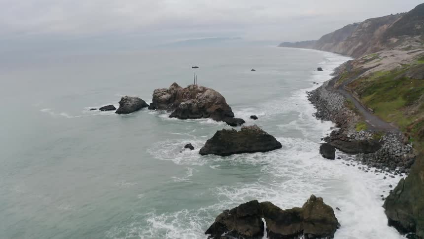 Aerial view of waves crashing in to the shore