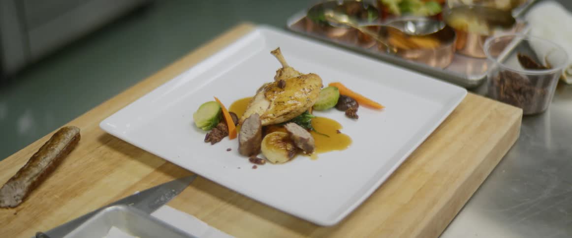 Plated meal with meat and vegetables