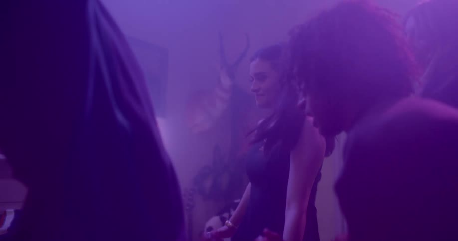 People are dancing in a night club together