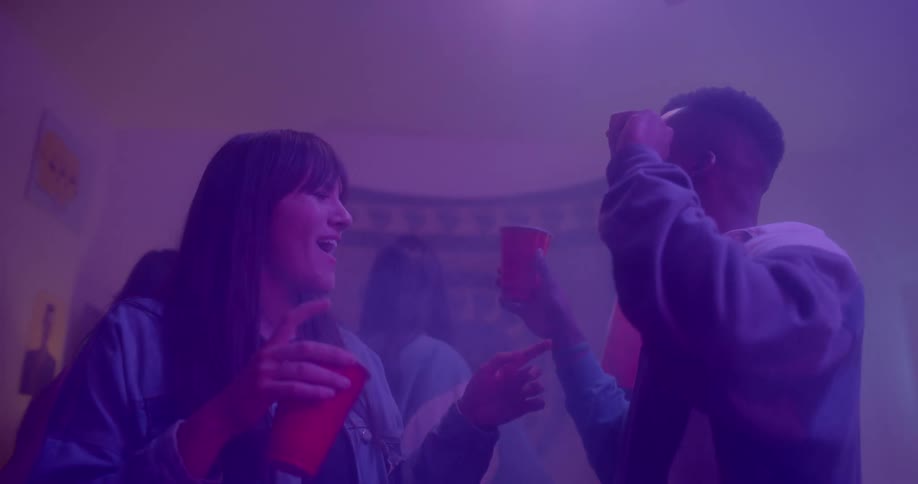 People are dancing in at a night club