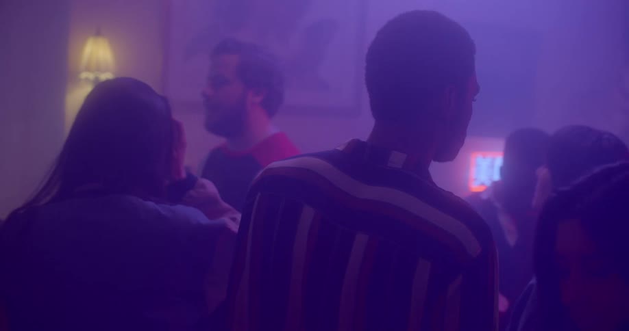 People are dancing in a night club