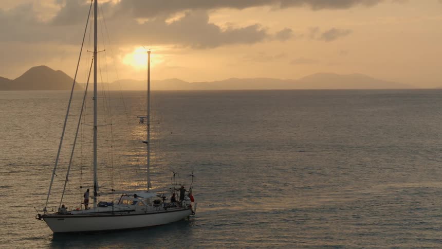 A boat sails across the ocean