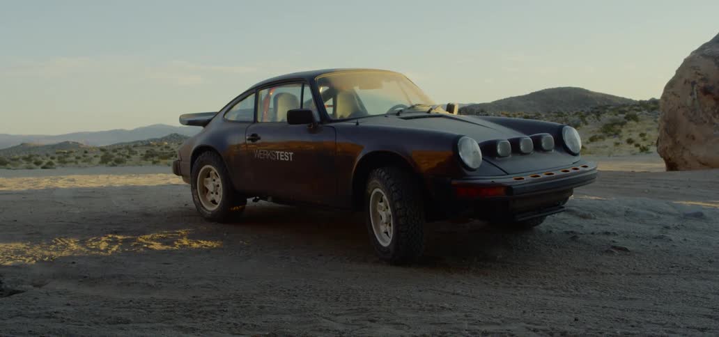 A sports car parked in the desert