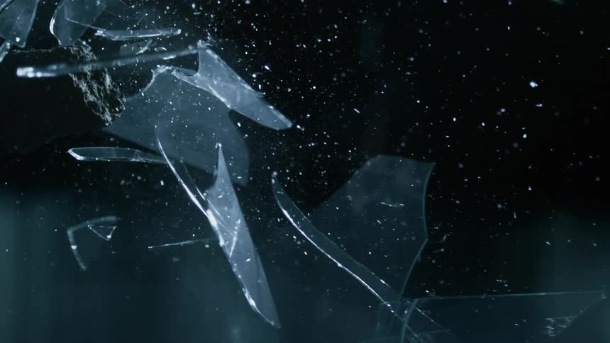 A piece of glass shatters