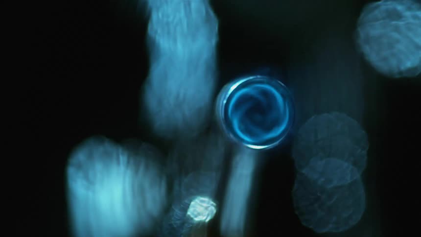Spinner spins underwater creating ripples