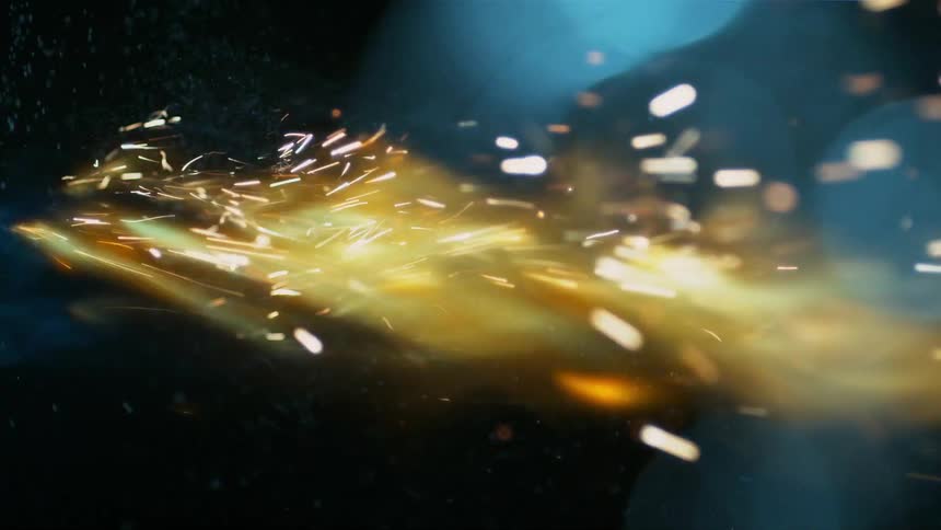 Sparks and fire fly through the air