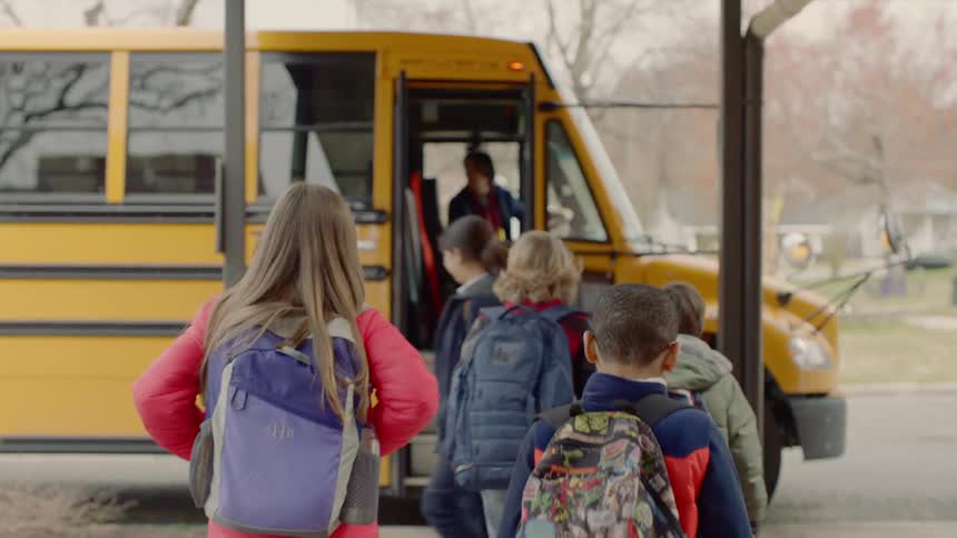 Children leaving the school board the school bus