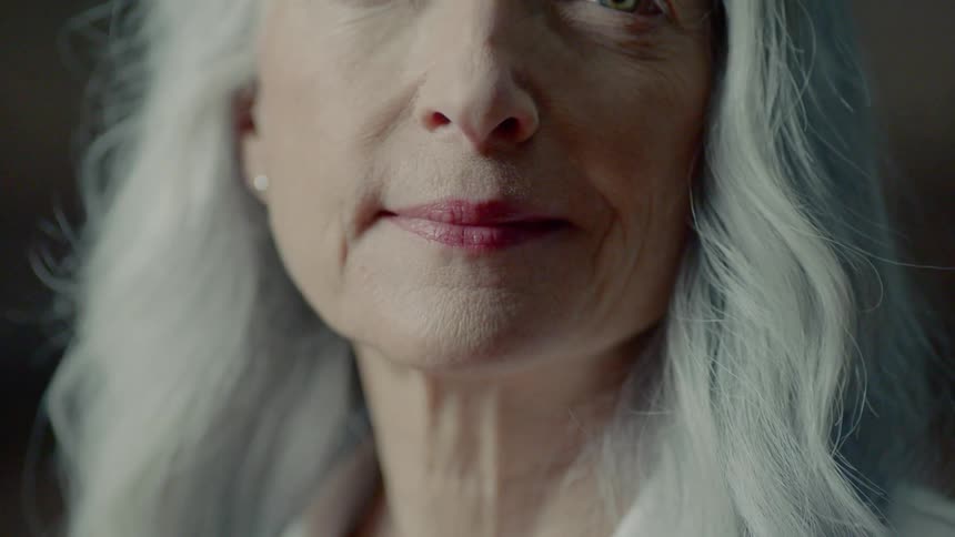 Footage of an elderly woman