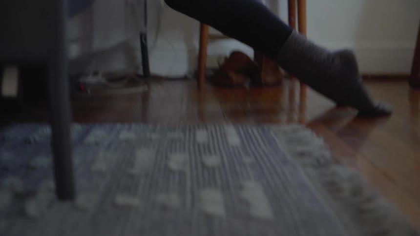 Blonde woman dances in her room