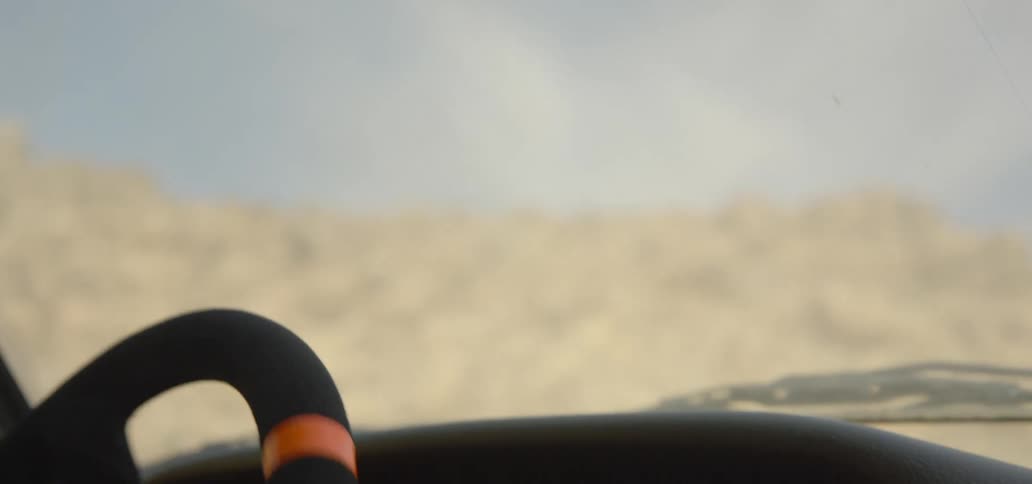 Inside view of a person driving a vehicle