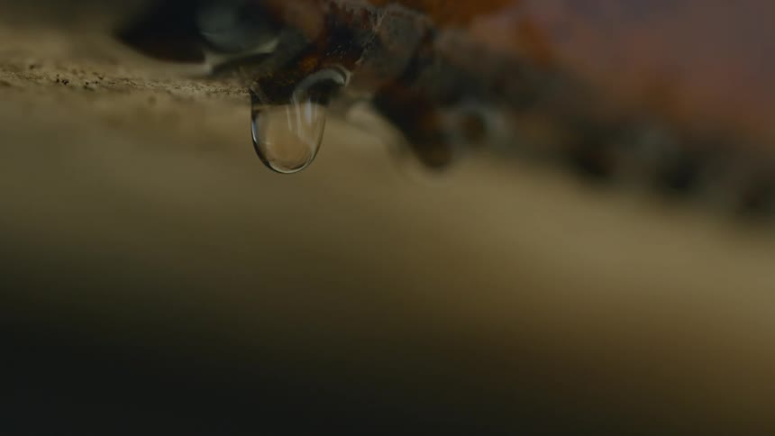 Water drops dripping from the ceiling