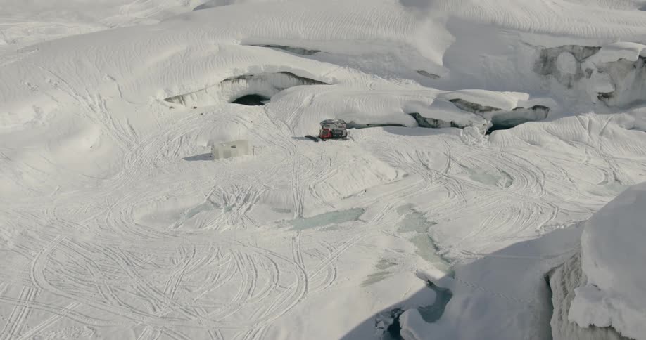 Aerial view of tracks on a snow covered landscape
