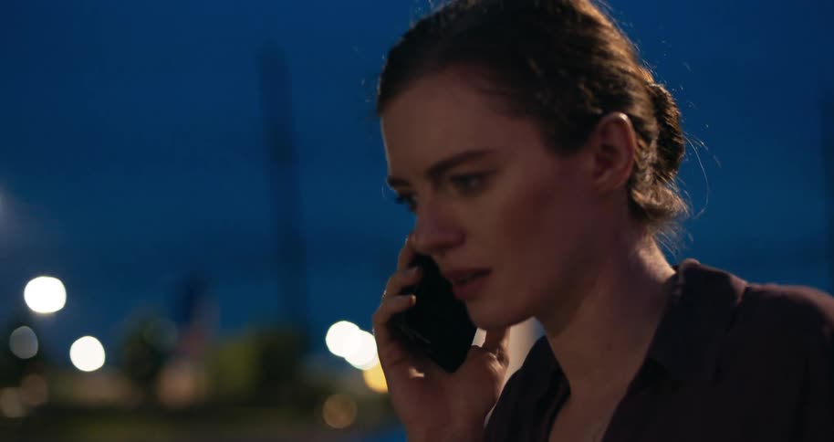 A woman talks on the phone
