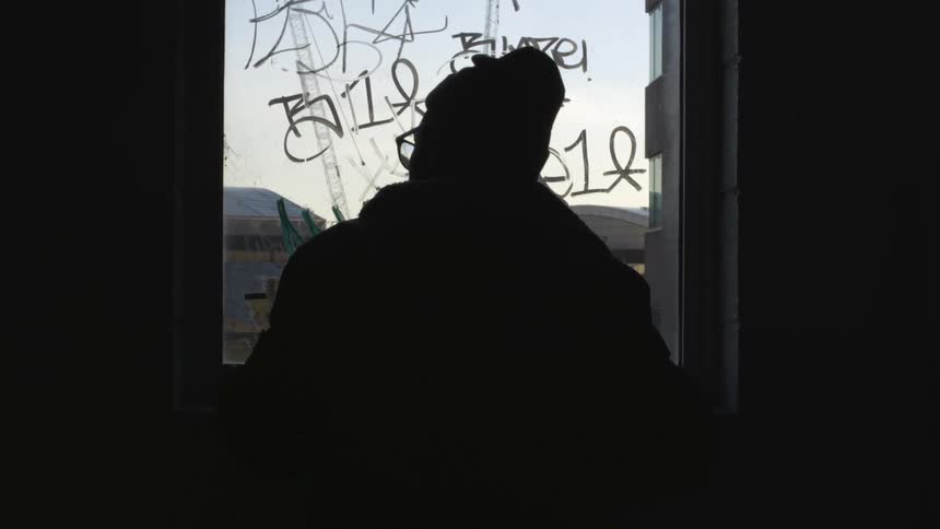 Man Sulks In City