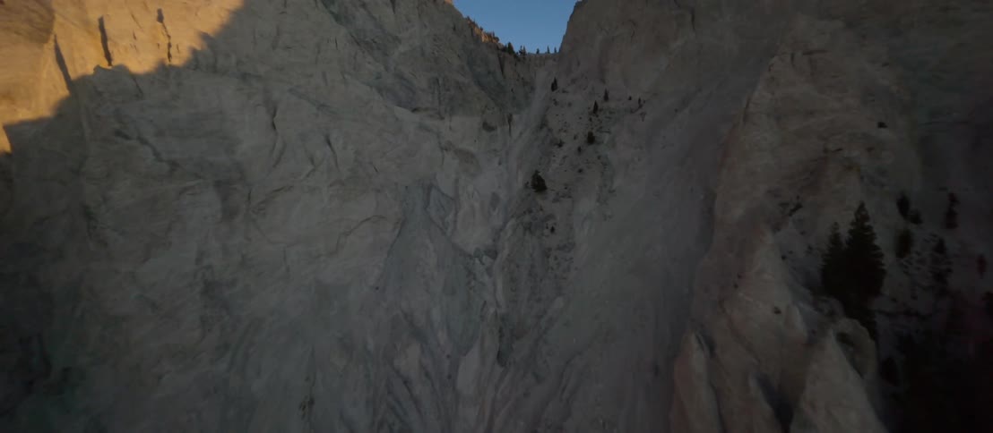 An aerial view of cliffs is displayed