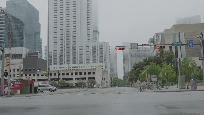 Intersection with empty streets of city downtown in mid day