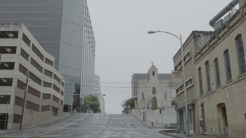 A city street empty of pedestrians and traffic