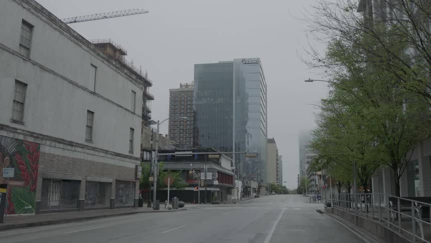 A city street is empty of both vehicles and people