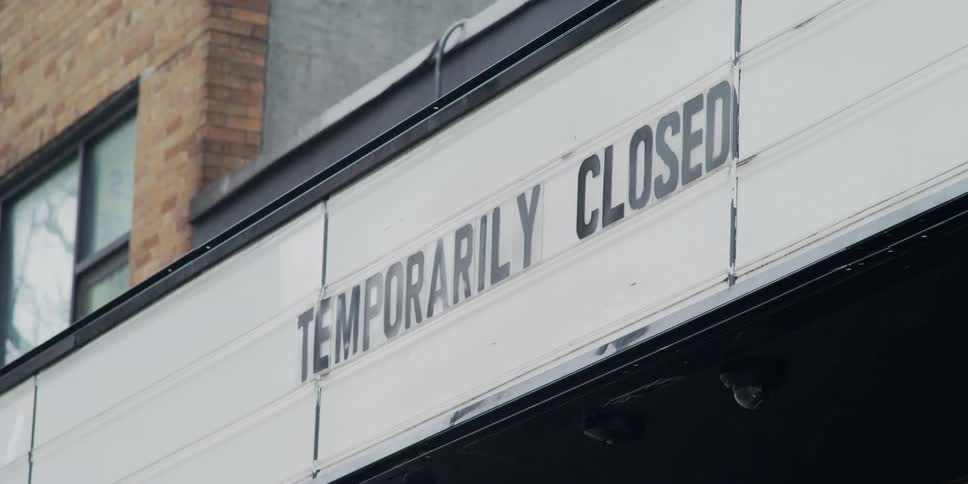A temporarily closed sign on a business