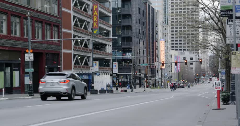 Cars and pedestrians on downtown city street